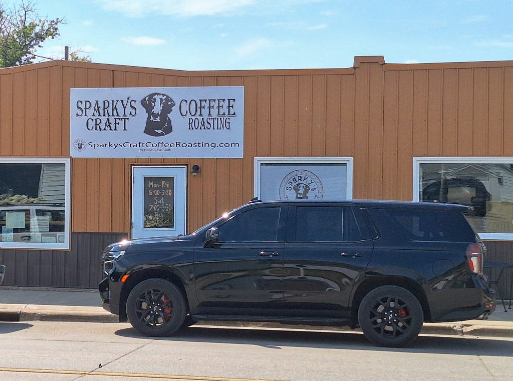 A Suburban park in front of a coffee shop
